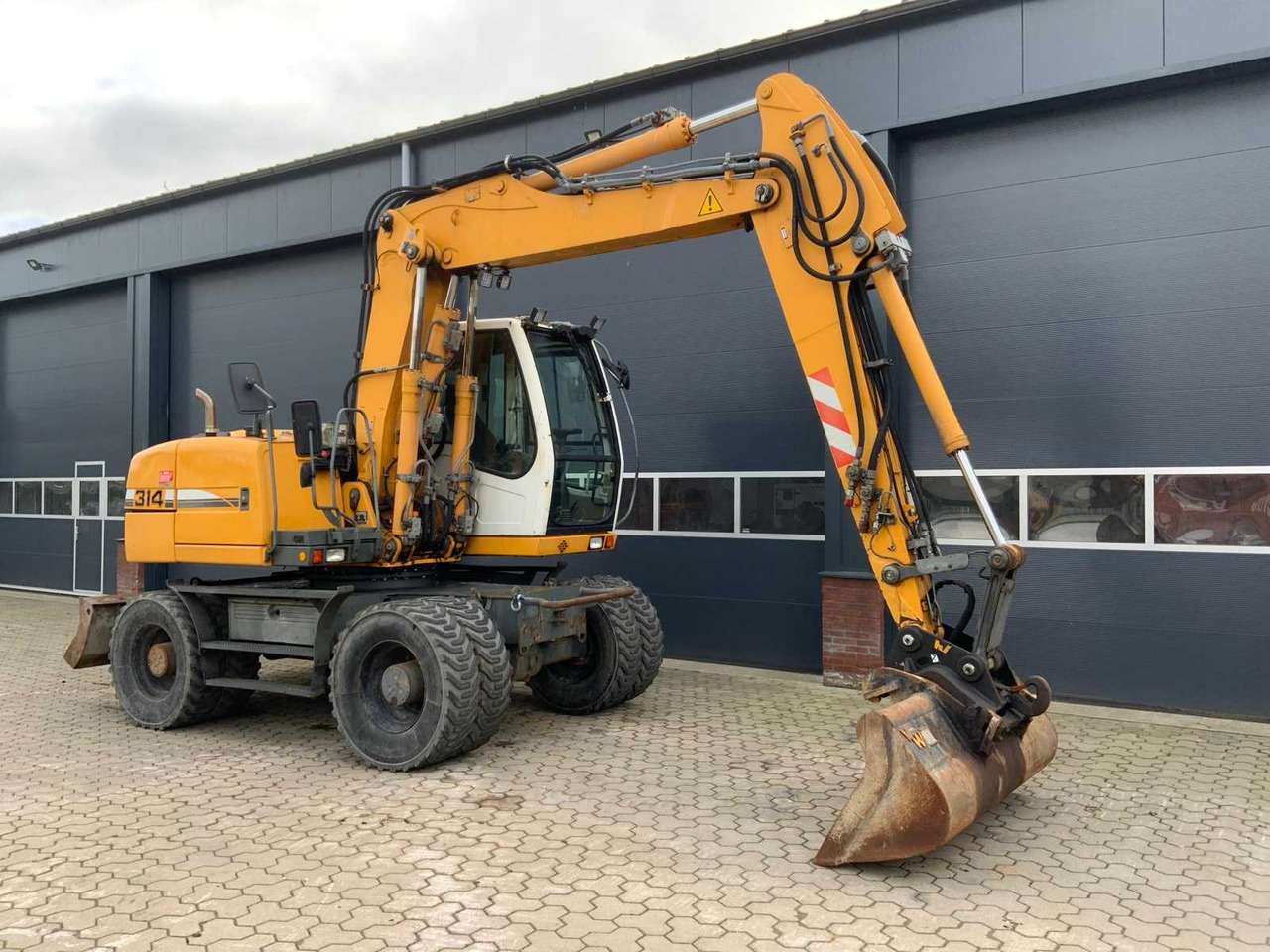 Liebherr A314 Litronic - حفارة دولاب: صورة 2 Liebherr A314 Litronic - حفارة دولاب: صورة 2