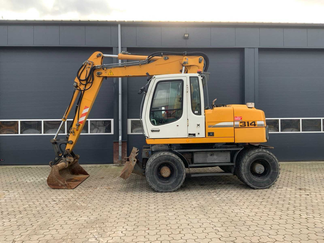 Liebherr A314 Litronic - حفارة دولاب: صورة 3 Liebherr A314 Litronic - حفارة دولاب: صورة 3