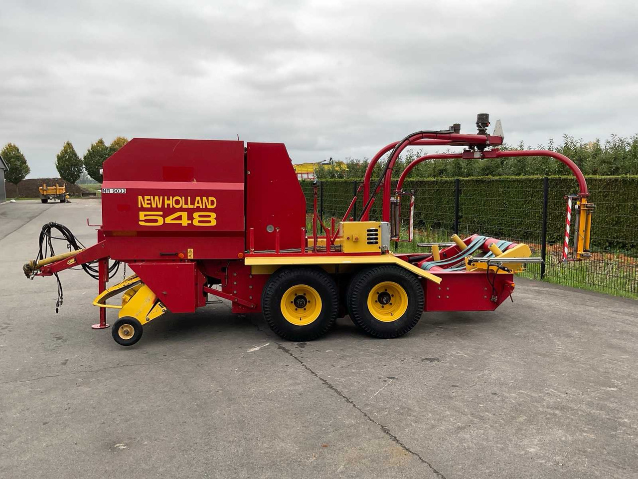 New Holland 548 - مكنة, آلة تغليف بالة التبن: صورة 5 New Holland 548 - مكنة, آلة تغليف بالة التبن: صورة 5