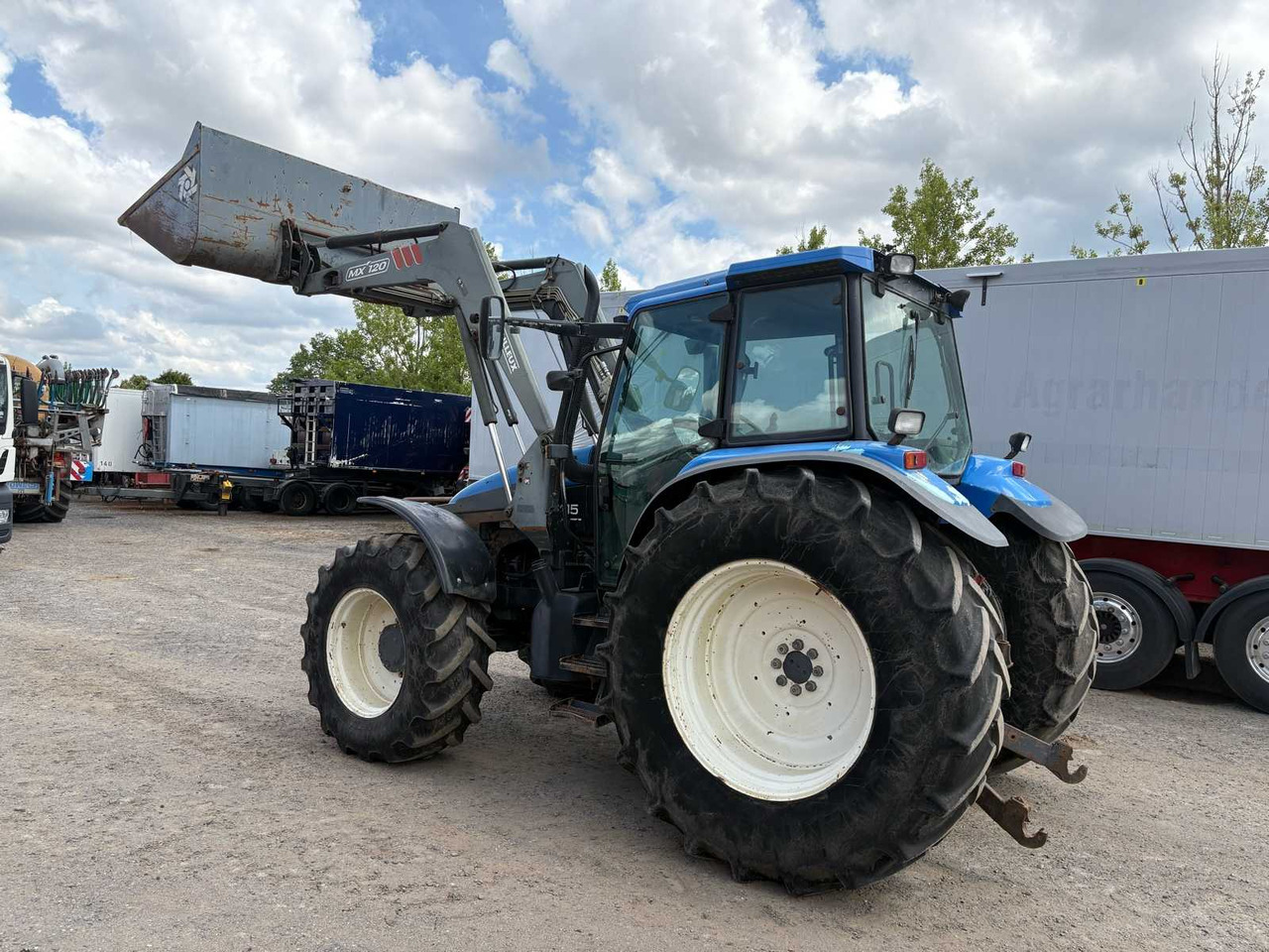 New Holland TM115 mit Frontlader - جرار: صورة 3 New Holland TM115 mit Frontlader - جرار: صورة 3
