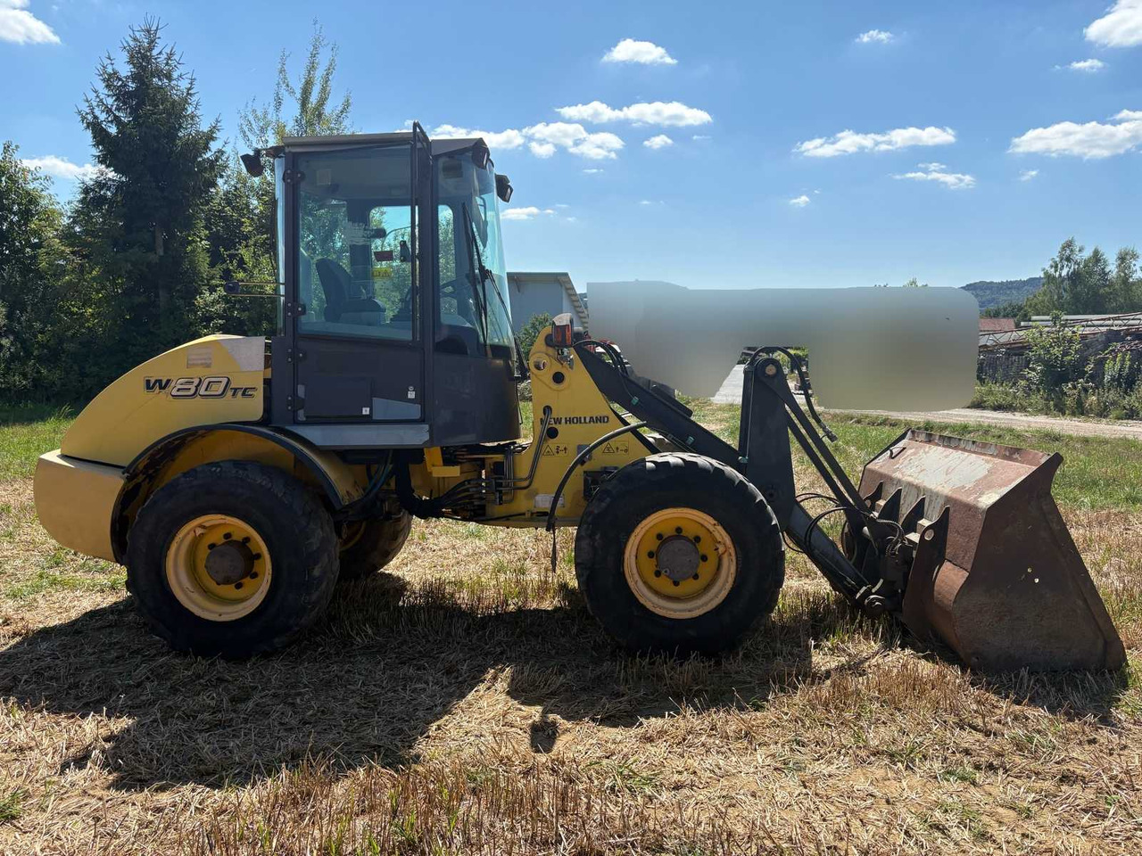 New Holland W80TC - اللودر بعجل: صورة 5 New Holland W80TC - اللودر بعجل: صورة 5