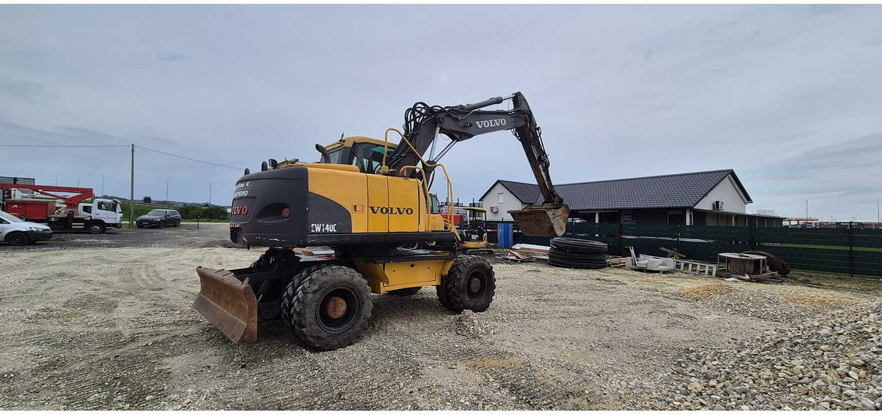 Volvo Construction Equipment EW140C - حفارة دولاب: صورة 1 Volvo Construction Equipment EW140C - حفارة دولاب: صورة 1
