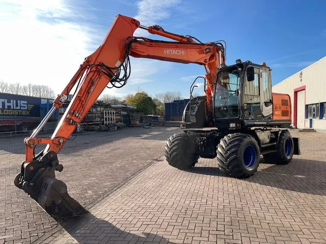 Hitachi ZX 140W-3 - حفارة دولاب: صورة 2 Hitachi ZX 140W-3 - حفارة دولاب: صورة 2