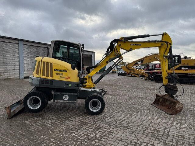 Neuson EW65, Verstellausleger, Hydr. S.W.S.,Div. Löffel - حفارة دولاب: صورة 5 Neuson EW65, Verstellausleger, Hydr. S.W.S.,Div. Löffel - حفارة دولاب: صورة 5