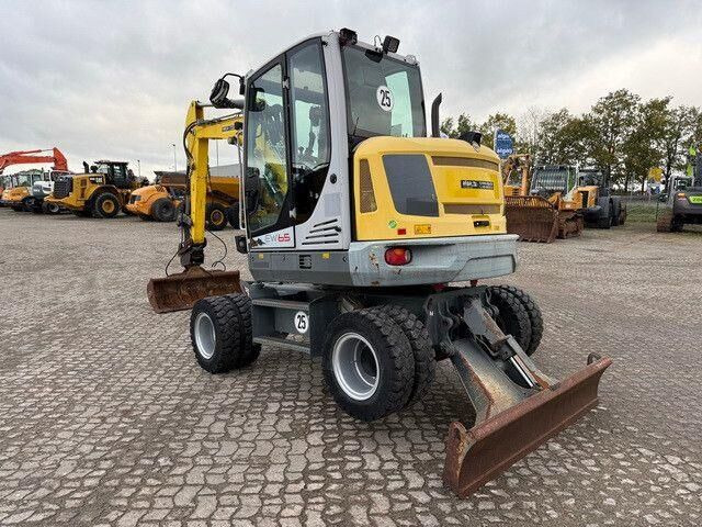 Neuson EW65, Verstellausleger, Hydr. S.W.S.,Div. Löffel - حفارة دولاب: صورة 3 Neuson EW65, Verstellausleger, Hydr. S.W.S.,Div. Löffel - حفارة دولاب: صورة 3