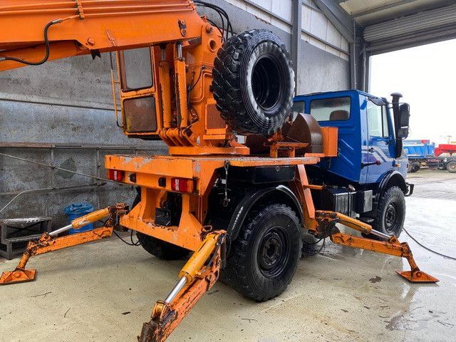 Unimog U 1450 4x4, Kran, Seilwinde - شاحنة كرين, شاحنة كرين: صورة 2 Unimog U 1450 4x4, Kran, Seilwinde - شاحنة كرين, شاحنة كرين: صورة 2
