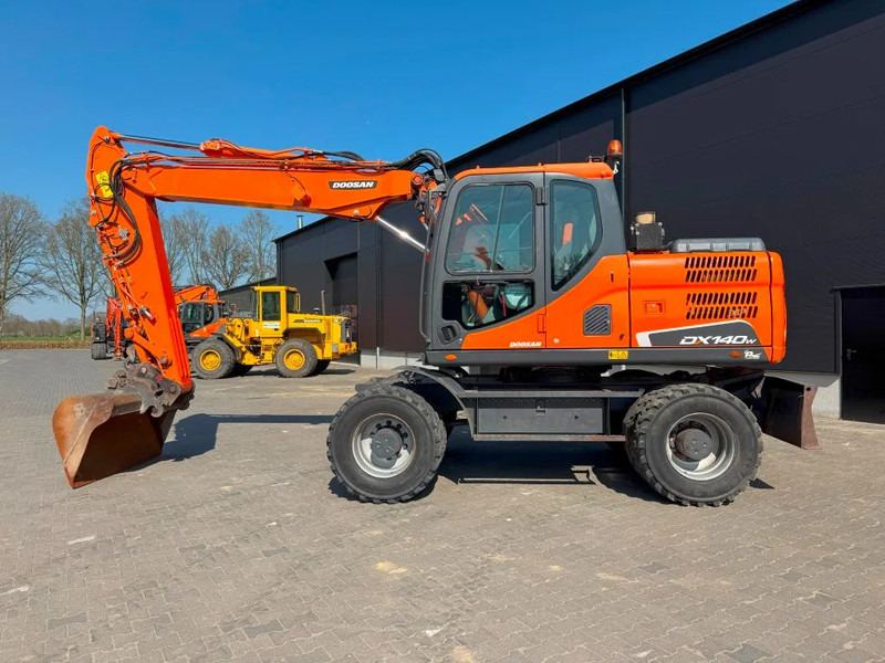 Doosan DX140-3 6000 uur ! NL Machine - حفارة دولاب: صورة 1 Doosan DX140-3 6000 uur ! NL Machine - حفارة دولاب: صورة 1