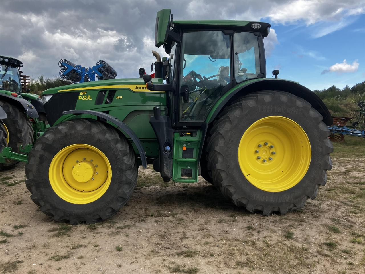 John Deere 6R 185 - جرار: صورة 1 John Deere 6R 185 - جرار: صورة 1
