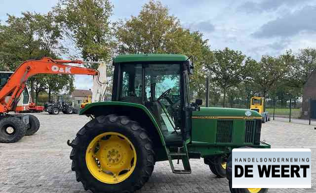 John Deere 6100 - جرار: صورة 4 John Deere 6100 - جرار: صورة 4