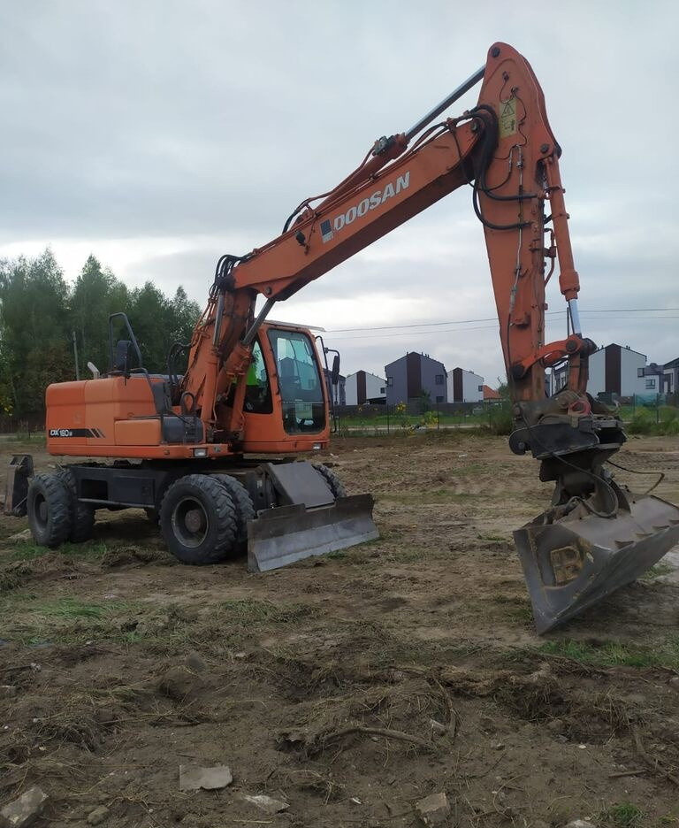 Doosan DX160 w - حفارة دولاب: صورة 4 Doosan DX160 w - حفارة دولاب: صورة 4