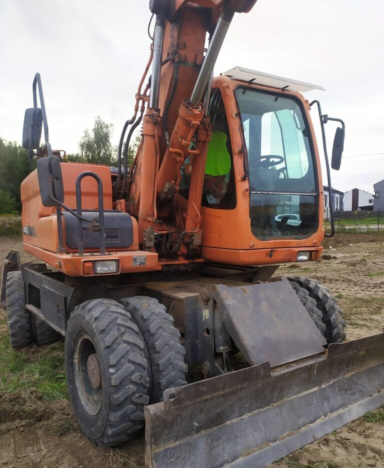 Doosan DX160 w - حفارة دولاب: صورة 3 Doosan DX160 w - حفارة دولاب: صورة 3