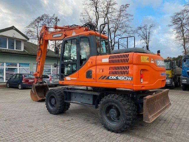 Doosan DX 160 W-3 - حفارة دولاب: صورة 4 Doosan DX 160 W-3 - حفارة دولاب: صورة 4
