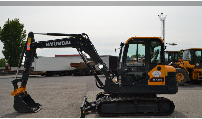 Hyundai HX55 Mini lánctalpas forgókotró - حفارة مُصَّغرة: صورة 5 Hyundai HX55 Mini lánctalpas forgókotró - حفارة مُصَّغرة: صورة 5
