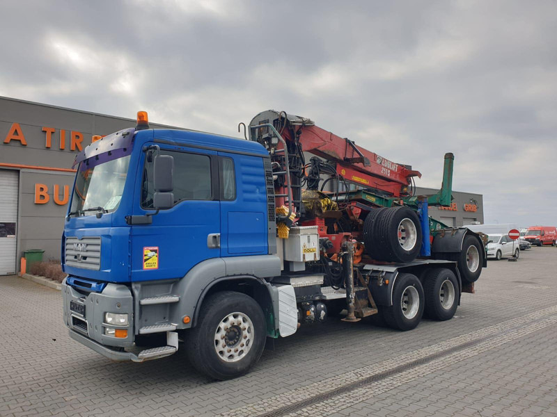 MAN TGA 26.480 6x4 LOGLIFT DOLL WOOD TRANSPORTER - شاحنة قطع الأشجار, شاحنة كرين: صورة 1 MAN TGA 26.480 6x4 LOGLIFT DOLL WOOD TRANSPORTER - شاحنة قطع الأشجار, شاحنة كرين: صورة 1