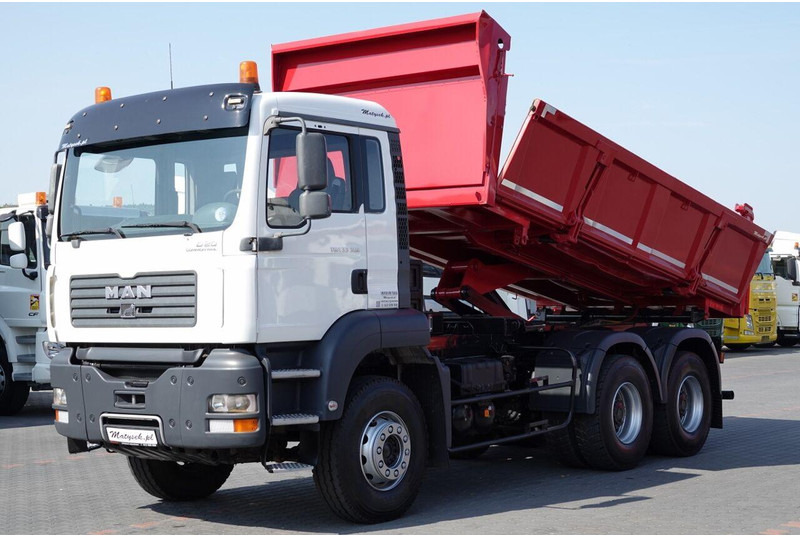 MAN TGA 33.390 / 6X4 / WYWROTKA 2 STRONNA / HYDROBURTA / MANUAL / SP - شاحنة قلاب: صورة 1 MAN TGA 33.390 / 6X4 / WYWROTKA 2 STRONNA / HYDROBURTA / MANUAL / SP - شاحنة قلاب: صورة 1
