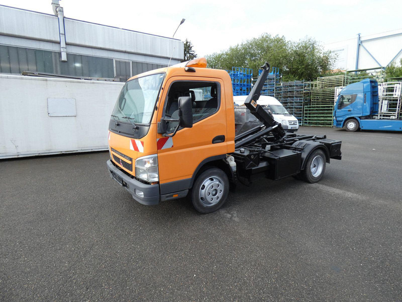 Mitsubishi Canter Fuso Abrollkipper - شاحنات مسطحة, شاحنة كرين: صورة 1 Mitsubishi Canter Fuso Abrollkipper - شاحنات مسطحة, شاحنة كرين: صورة 1