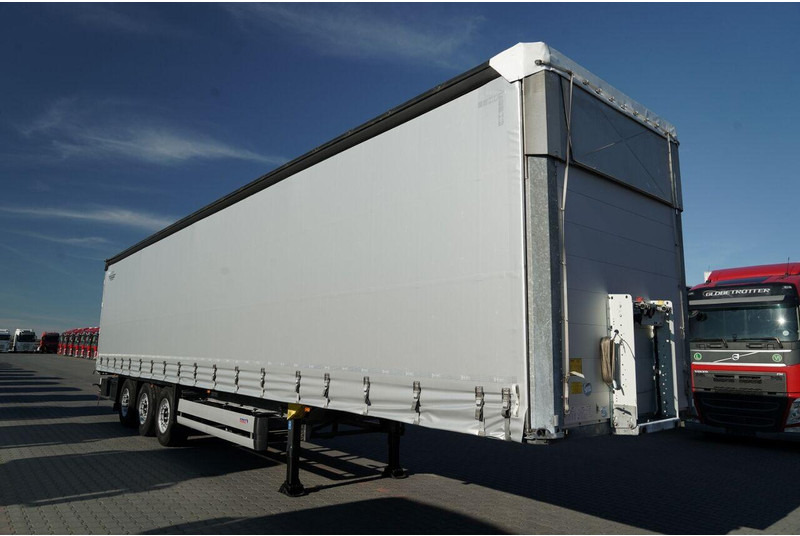 Schmitz Cargobull FIRANKA / STANDARD / MULDA DO STALI - 9 M / DACH PODNOSZONY / OŚ - نصف مقطورة ستارة: صورة 2 Schmitz Cargobull FIRANKA / STANDARD / MULDA DO STALI - 9 M / DACH PODNOSZONY / OŚ - نصف مقطورة ستارة: صورة 2