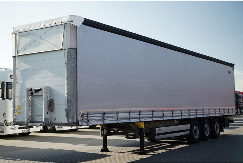 Schmitz Cargobull FIRANKA / STANDARD / MULDA DO STALI - 9 M / DACH PODNOSZONY / OŚ - نصف مقطورة ستارة: صورة 3 Schmitz Cargobull FIRANKA / STANDARD / MULDA DO STALI - 9 M / DACH PODNOSZONY / OŚ - نصف مقطورة ستارة: صورة 3