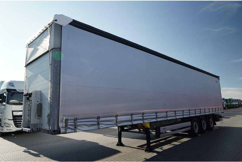 Schmitz Cargobull FIRANKA / STANDARD / MULDA DO STALI - 9 M / DACH PODNOSZONY / OŚ - نصف مقطورة ستارة: صورة 4 Schmitz Cargobull FIRANKA / STANDARD / MULDA DO STALI - 9 M / DACH PODNOSZONY / OŚ - نصف مقطورة ستارة: صورة 4