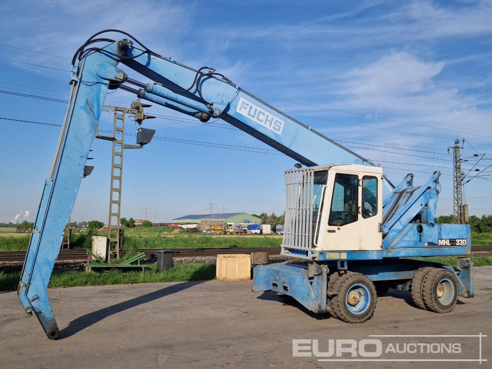 Fuchs MHL 330 - حفارة دولاب: صورة 1 Fuchs MHL 330 - حفارة دولاب: صورة 1