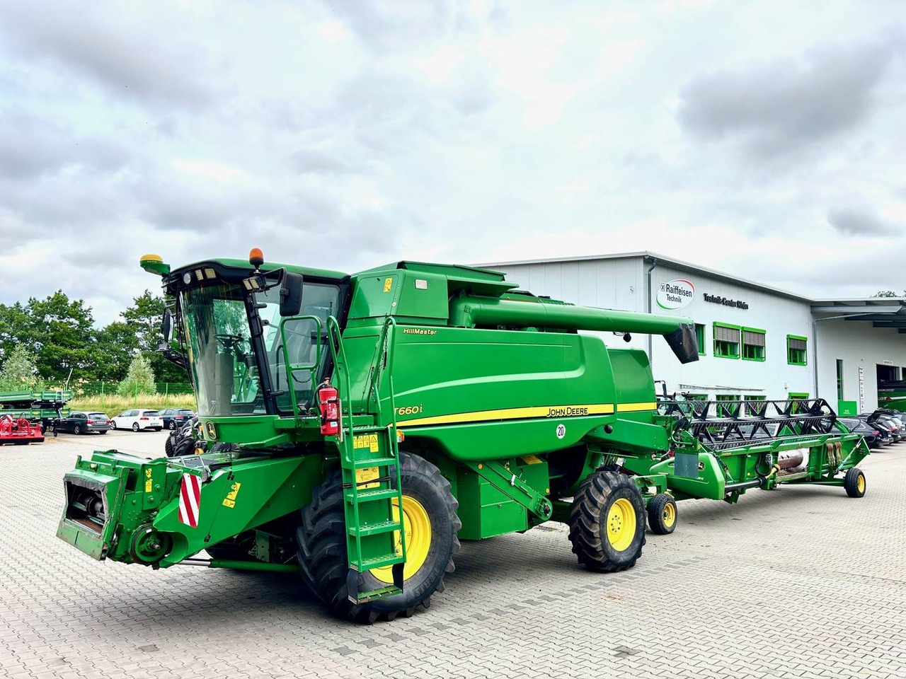 John Deere T660 i Hillmaster - حصادة موحَّدة: صورة 1 John Deere T660 i Hillmaster - حصادة موحَّدة: صورة 1