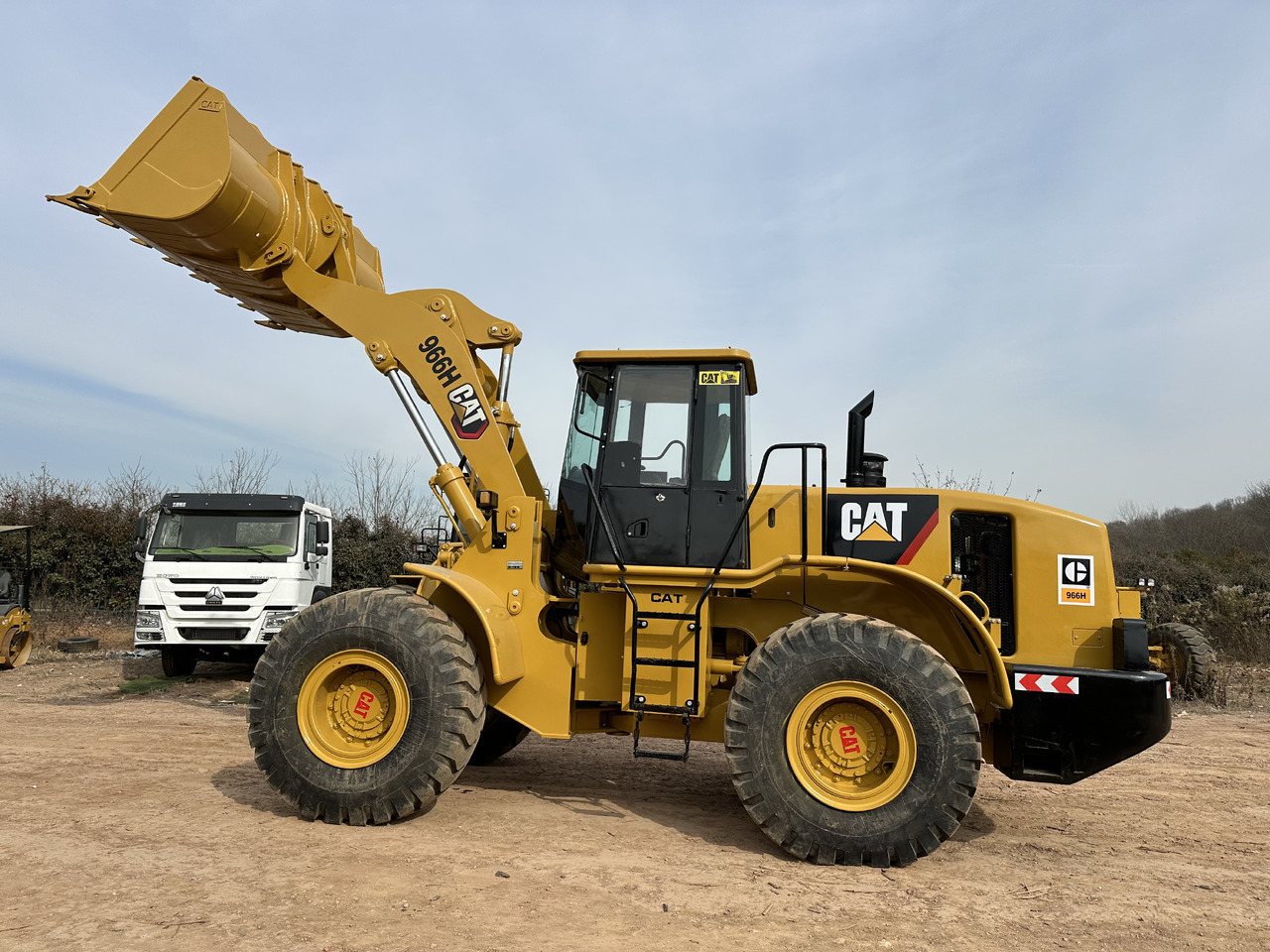 CATERPILLAR 966H - اللودر بعجل: صورة 1 CATERPILLAR 966H - اللودر بعجل: صورة 1