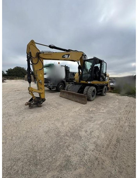 Caterpillar M313D - حفارة دولاب: صورة 1 Caterpillar M313D - حفارة دولاب: صورة 1