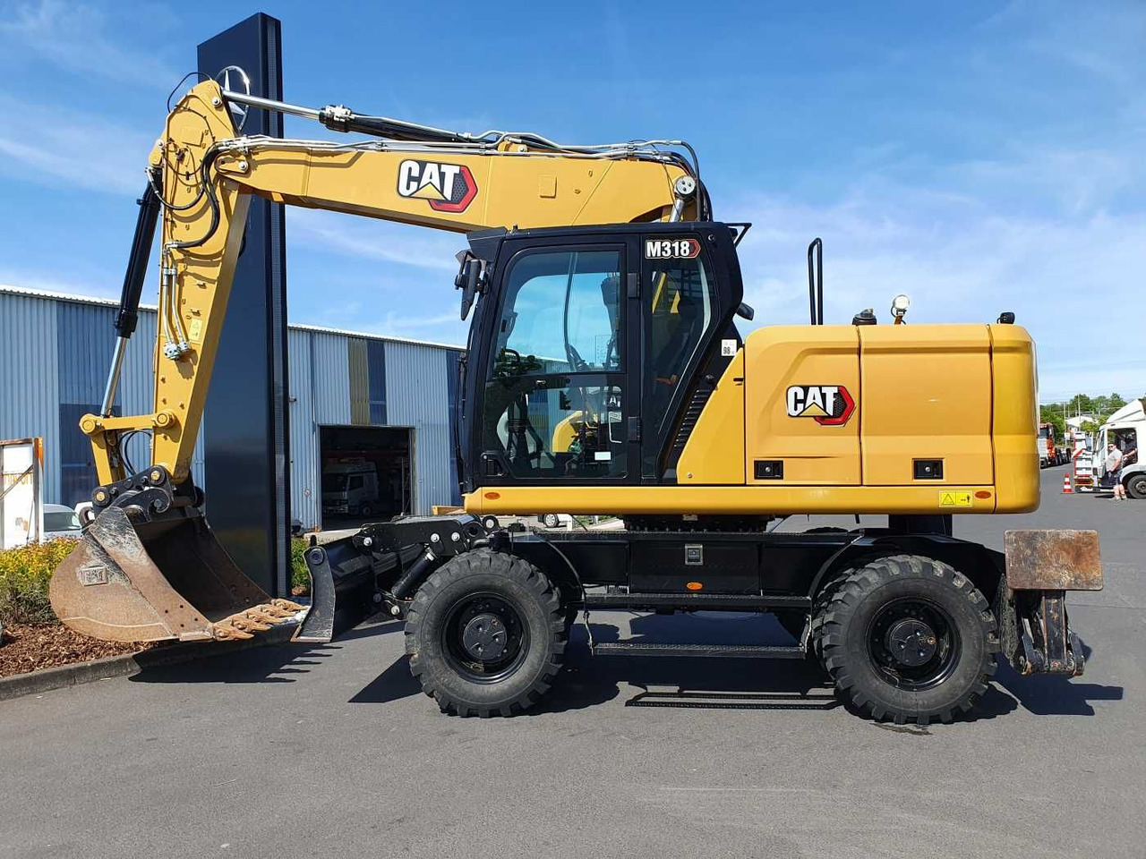 CAT M318 / 2022 / nur 286h! / Tieflöffel / Pratzen - حفارة دولاب: صورة 2 CAT M318 / 2022 / nur 286h! / Tieflöffel / Pratzen - حفارة دولاب: صورة 2