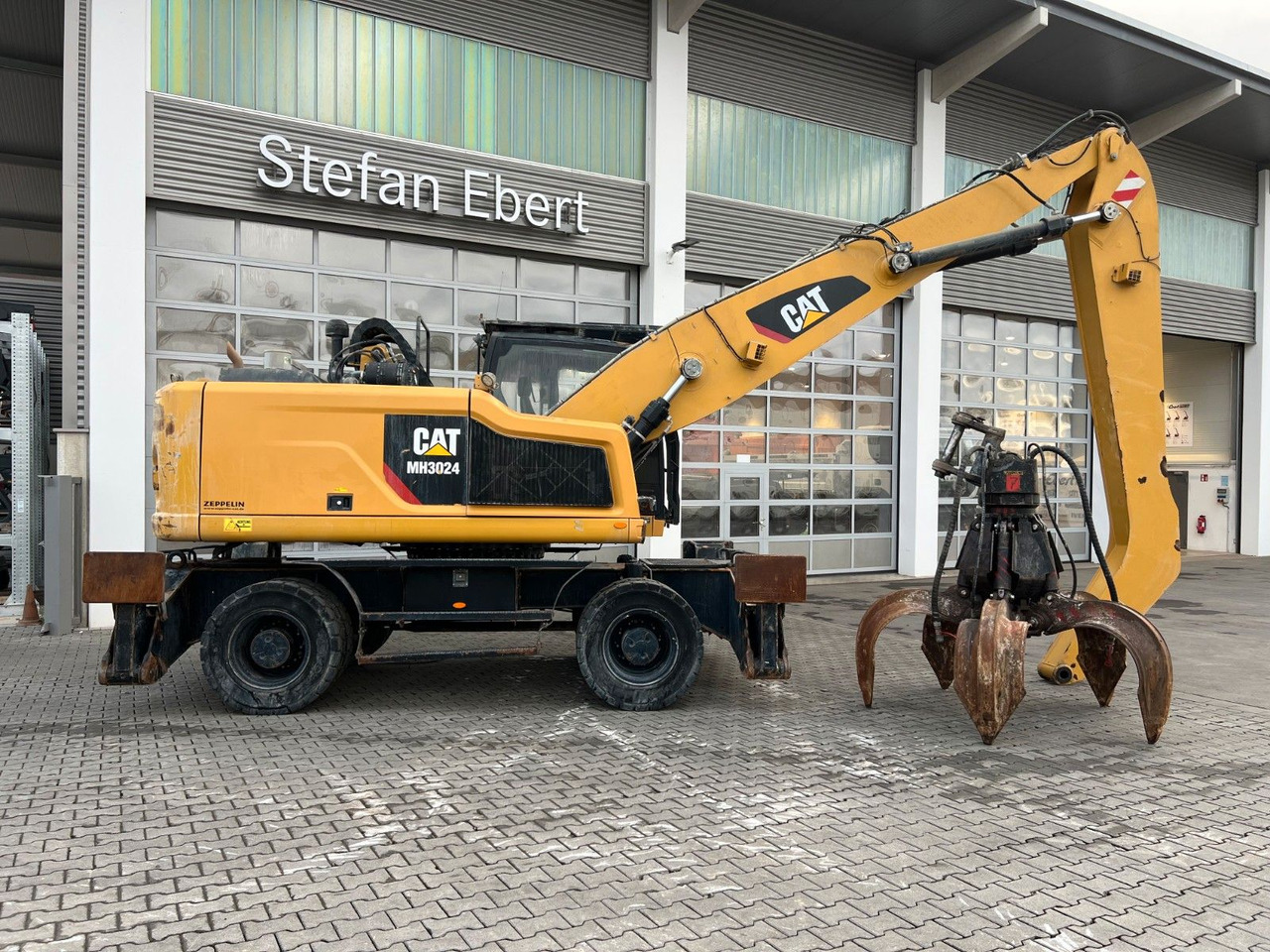 CAT MH3024 / MH 3024 / Greifer / 2018 / 10.735h - حفارة دولاب: صورة 3 CAT MH3024 / MH 3024 / Greifer / 2018 / 10.735h - حفارة دولاب: صورة 3