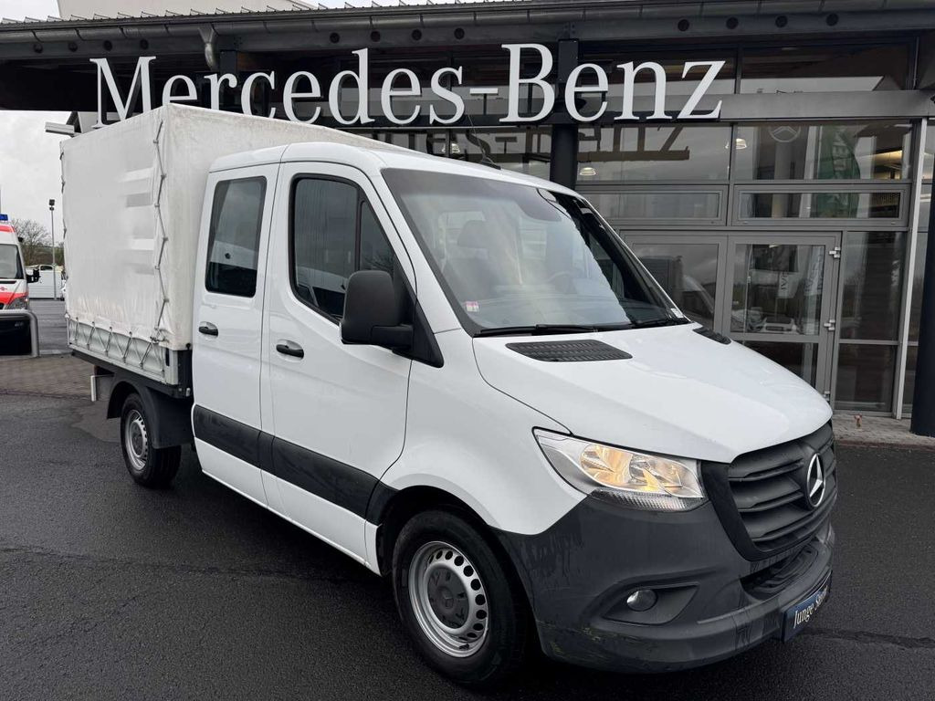 Mercedes-Benz Sprinter 215 CDI DoKa 9G Klima AHK Tempomat SHZ - شاحنة ستارة جانبية: صورة 1 Mercedes-Benz Sprinter 215 CDI DoKa 9G Klima AHK Tempomat SHZ - شاحنة ستارة جانبية: صورة 1