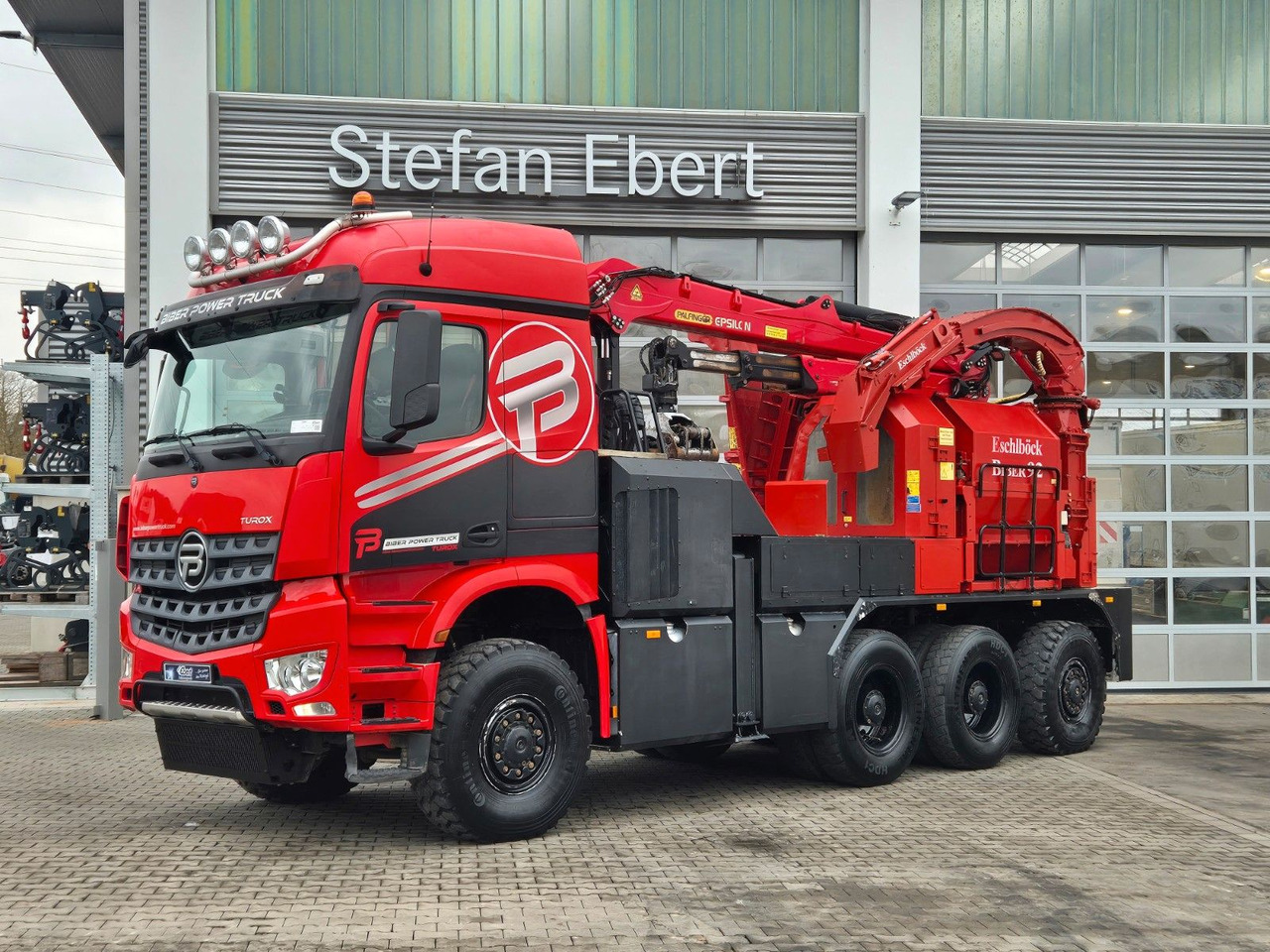 Mercedes-Benz TUROX 8x8 Eschlböck Biber 92 Holzhacker / 1.512h - شاحنة قطع الأشجار, شاحنة كرين: صورة 1 Mercedes-Benz TUROX 8x8 Eschlböck Biber 92 Holzhacker / 1.512h - شاحنة قطع الأشجار, شاحنة كرين: صورة 1