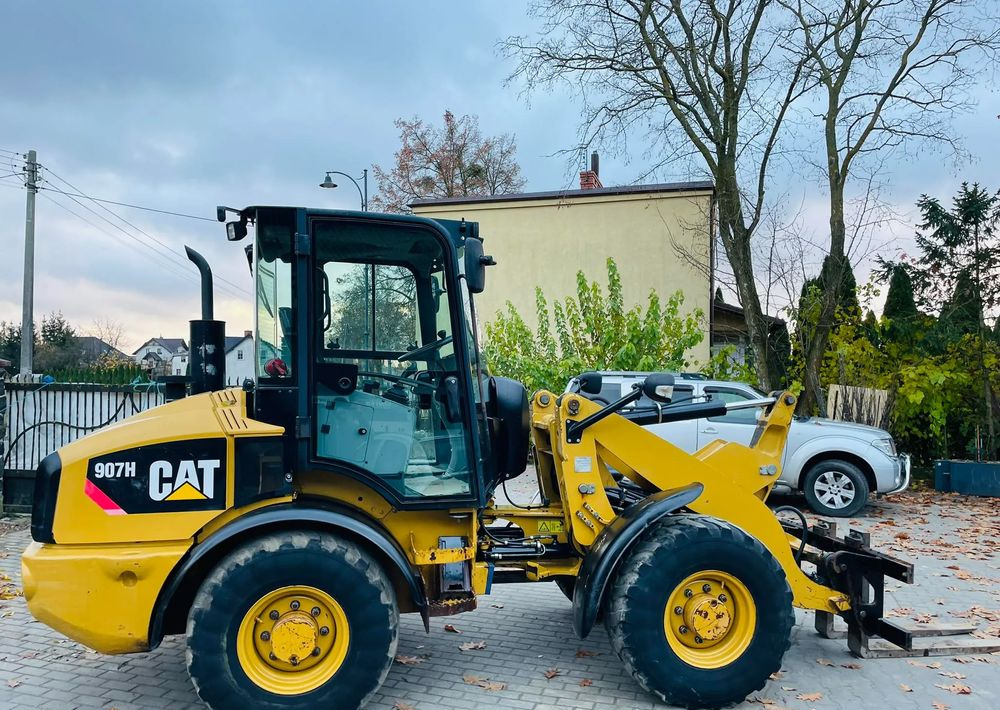 Caterpillar 907H - اللودر بعجل: صورة 1 Caterpillar 907H - اللودر بعجل: صورة 1