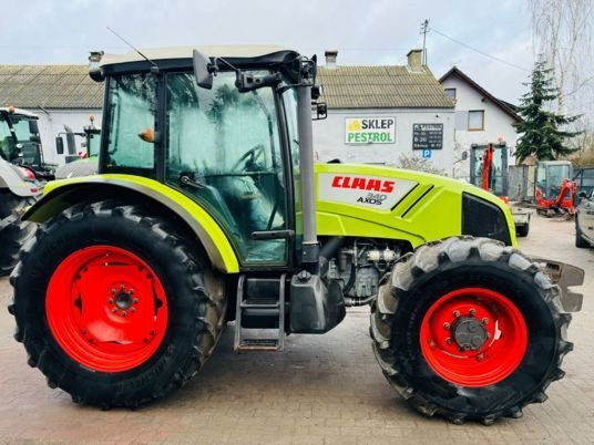 Claas AXOS 340 - جرار: صورة 4 Claas AXOS 340 - جرار: صورة 4