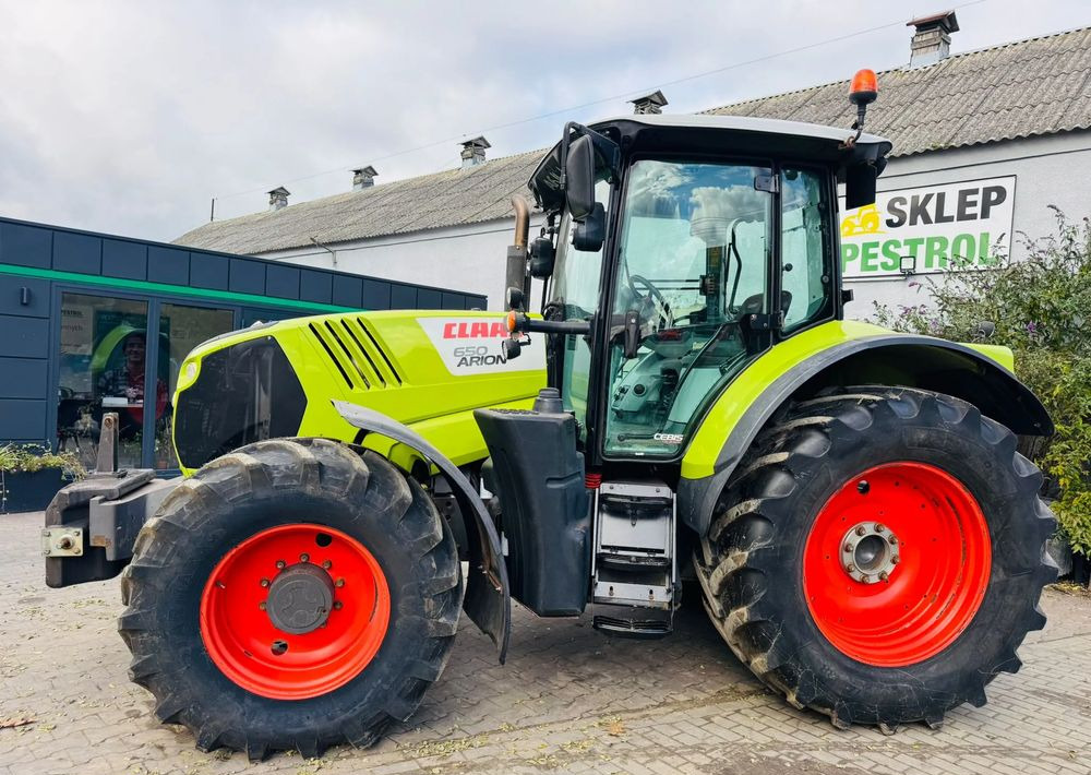 Claas Arion 650 - جرار: صورة 1 Claas Arion 650 - جرار: صورة 1