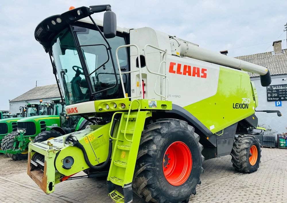 Claas LEXION 750 APS HYBRID - حصادة موحَّدة: صورة 2 Claas LEXION 750 APS HYBRID - حصادة موحَّدة: صورة 2