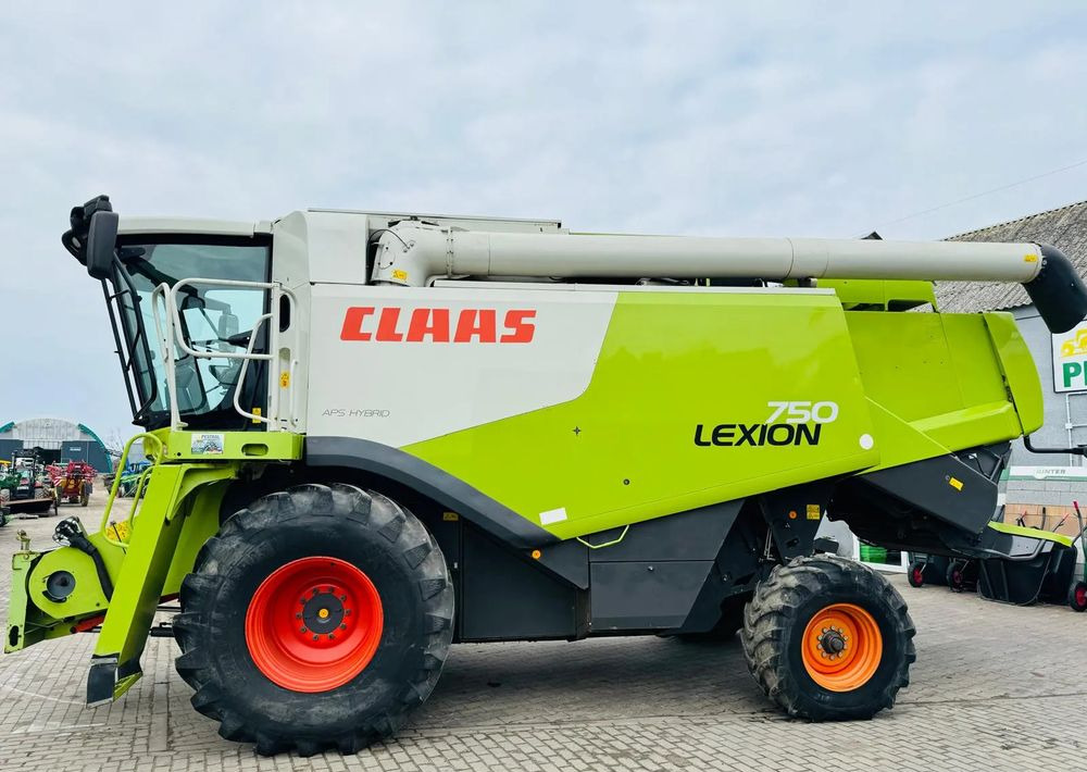 Claas LEXION 750 APS HYBRID - حصادة موحَّدة: صورة 1 Claas LEXION 750 APS HYBRID - حصادة موحَّدة: صورة 1