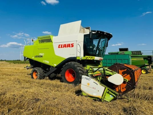 Claas LEXION 750 APS HYBRID - حصادة موحَّدة: صورة 1 Claas LEXION 750 APS HYBRID - حصادة موحَّدة: صورة 1