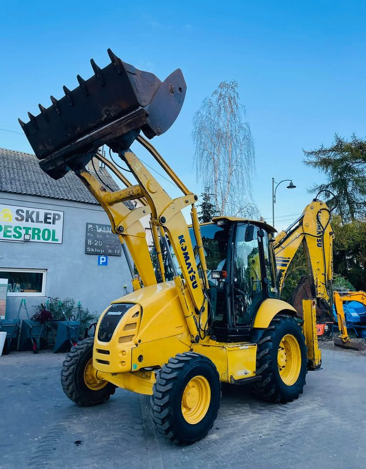 Komatsu WB93R - جرافة حفار: صورة 1 Komatsu WB93R - جرافة حفار: صورة 1