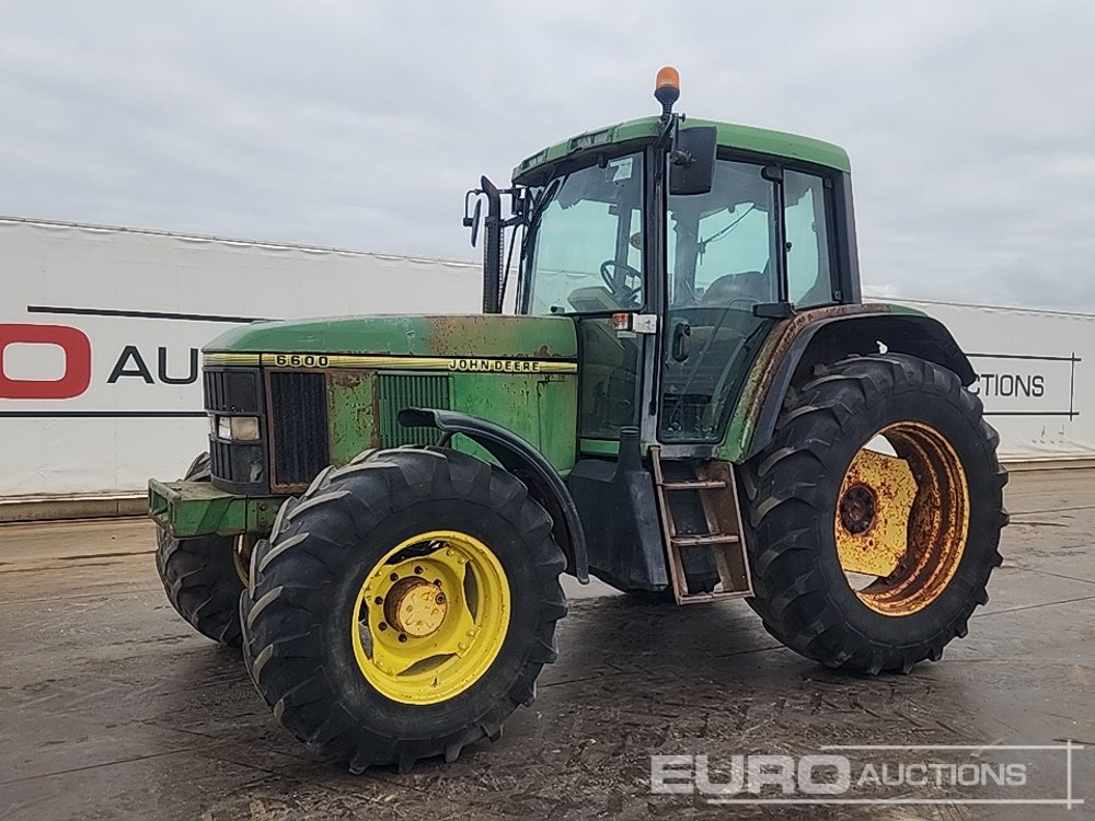 1996 John Deere 6600 - جرار: صورة 1 1996 John Deere 6600 - جرار: صورة 1