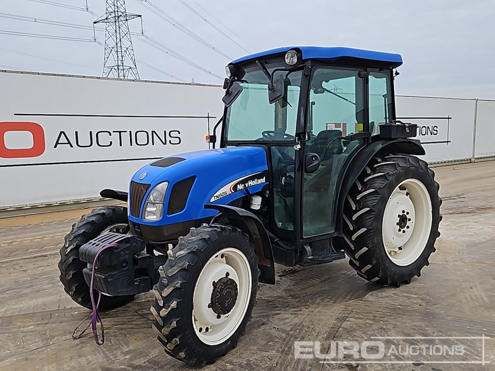 New Holland TN60SA - جرار: صورة 1 New Holland TN60SA - جرار: صورة 1