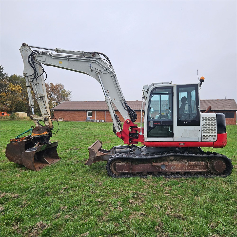 Takeuchi TB1140 - حفار زحاف: صورة 1 Takeuchi TB1140 - حفار زحاف: صورة 1
