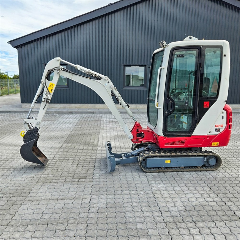 Takeuchi TB216 - حفارة مُصَّغرة: صورة 1 Takeuchi TB216 - حفارة مُصَّغرة: صورة 1