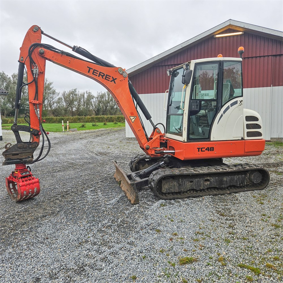 Terex TC48 - حفارة مُصَّغرة: صورة 1 Terex TC48 - حفارة مُصَّغرة: صورة 1