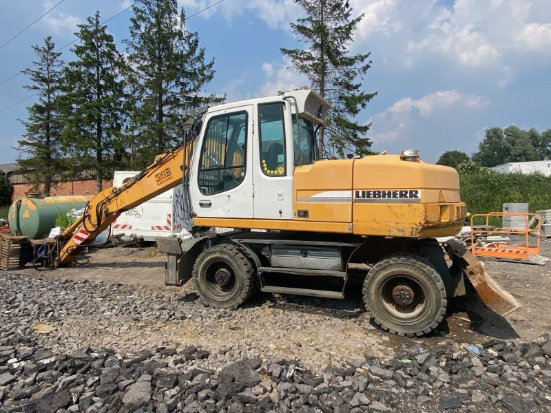 Liebherr A316Litronic - حفارة دولاب: صورة 4 Liebherr A316Litronic - حفارة دولاب: صورة 4