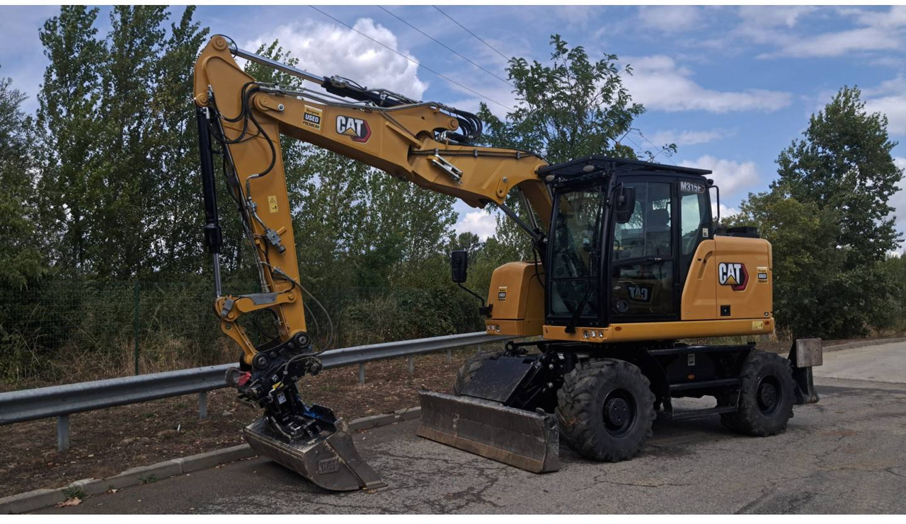CAT M315F IVC - حفارة دولاب: صورة 1 CAT M315F IVC - حفارة دولاب: صورة 1