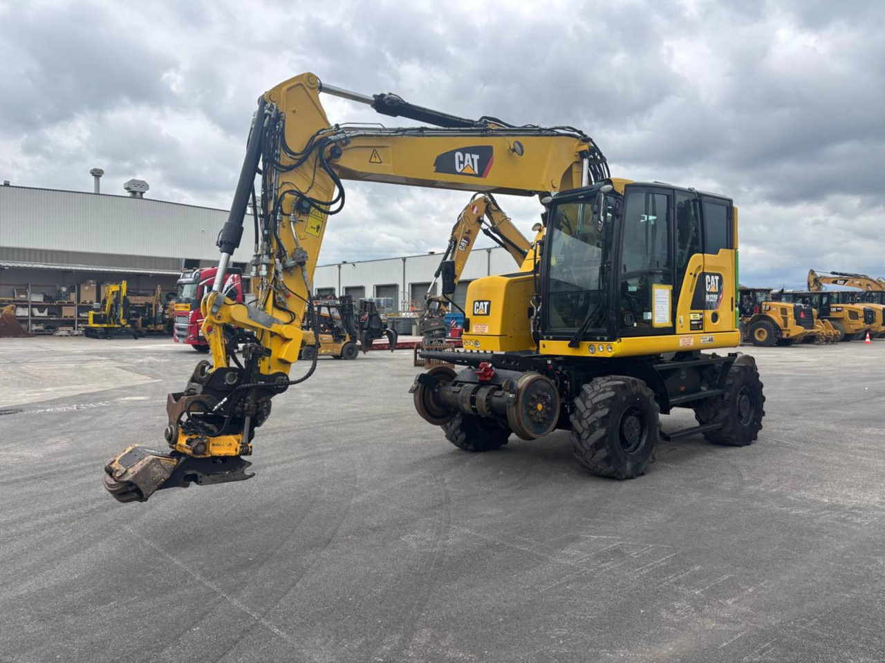 CAT M323F - حفارة دولاب: صورة 2 CAT M323F - حفارة دولاب: صورة 2
