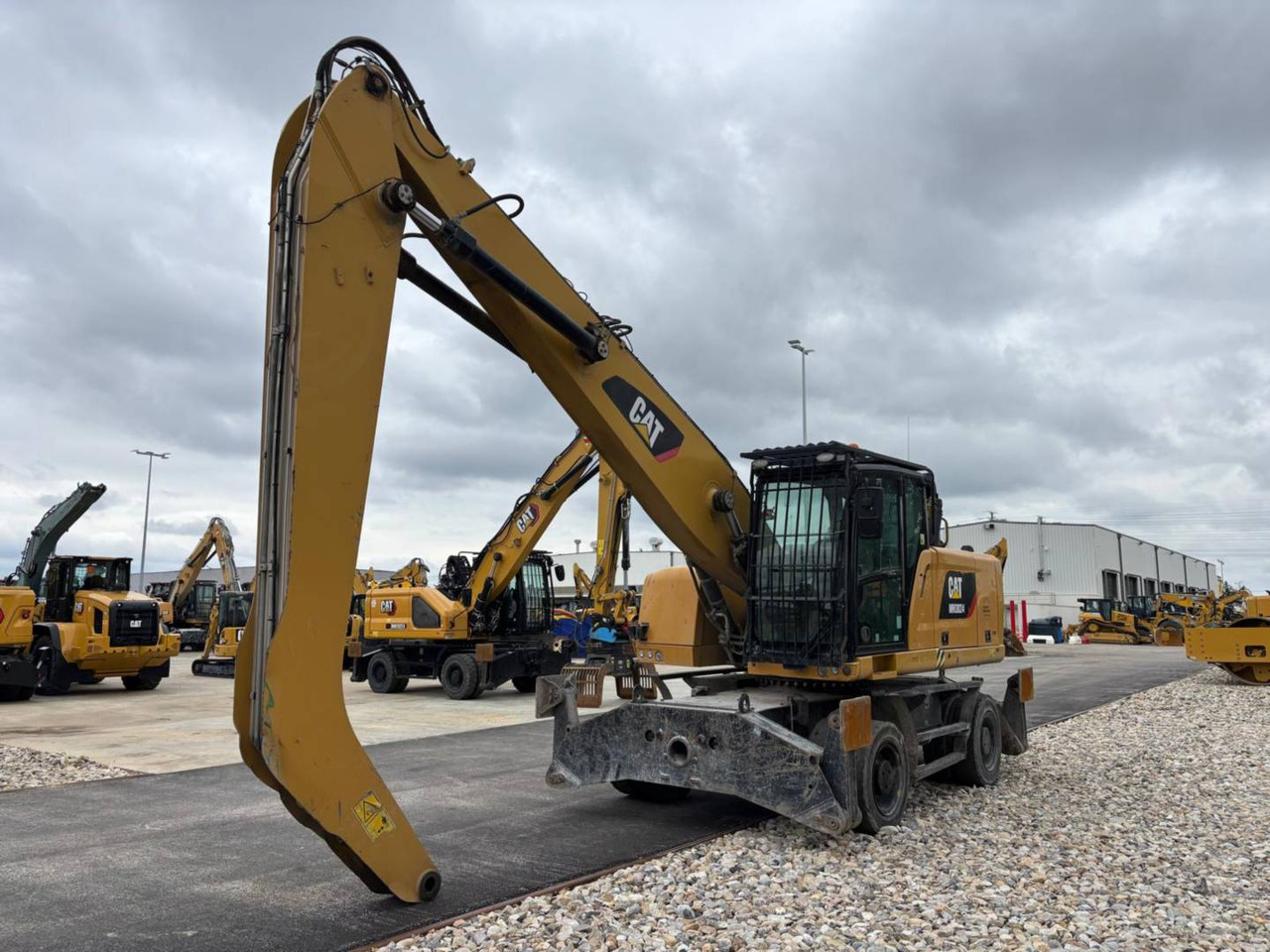 CAT MH3024-1 - حفارة دولاب: صورة 2 CAT MH3024-1 - حفارة دولاب: صورة 2