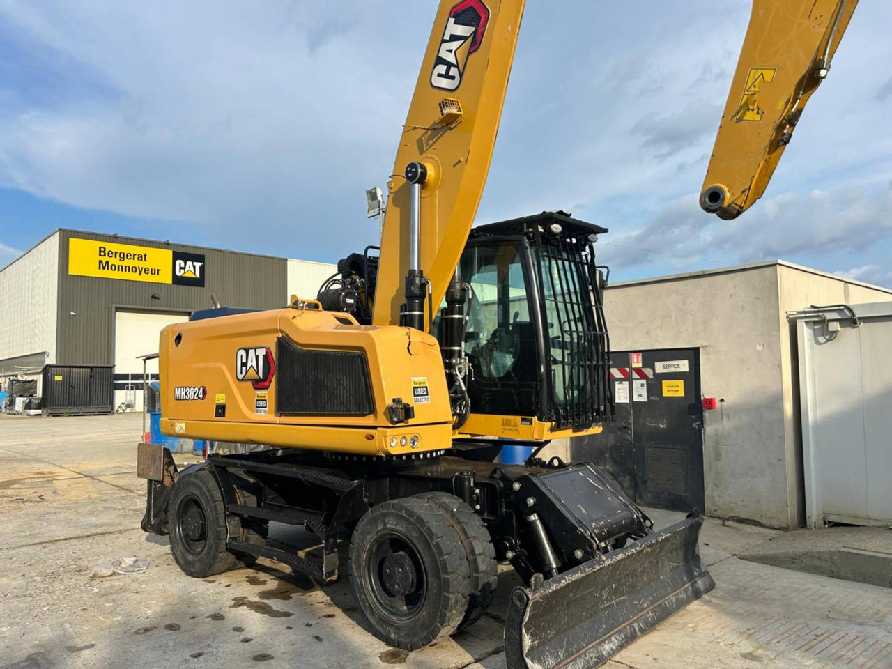 CAT MH3024-1 - حفارة دولاب: صورة 2 CAT MH3024-1 - حفارة دولاب: صورة 2