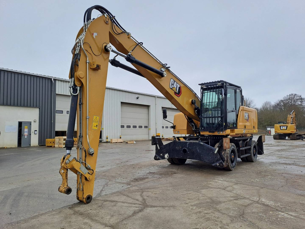 CAT MH3024 - حفارة دولاب: صورة 1 CAT MH3024 - حفارة دولاب: صورة 1