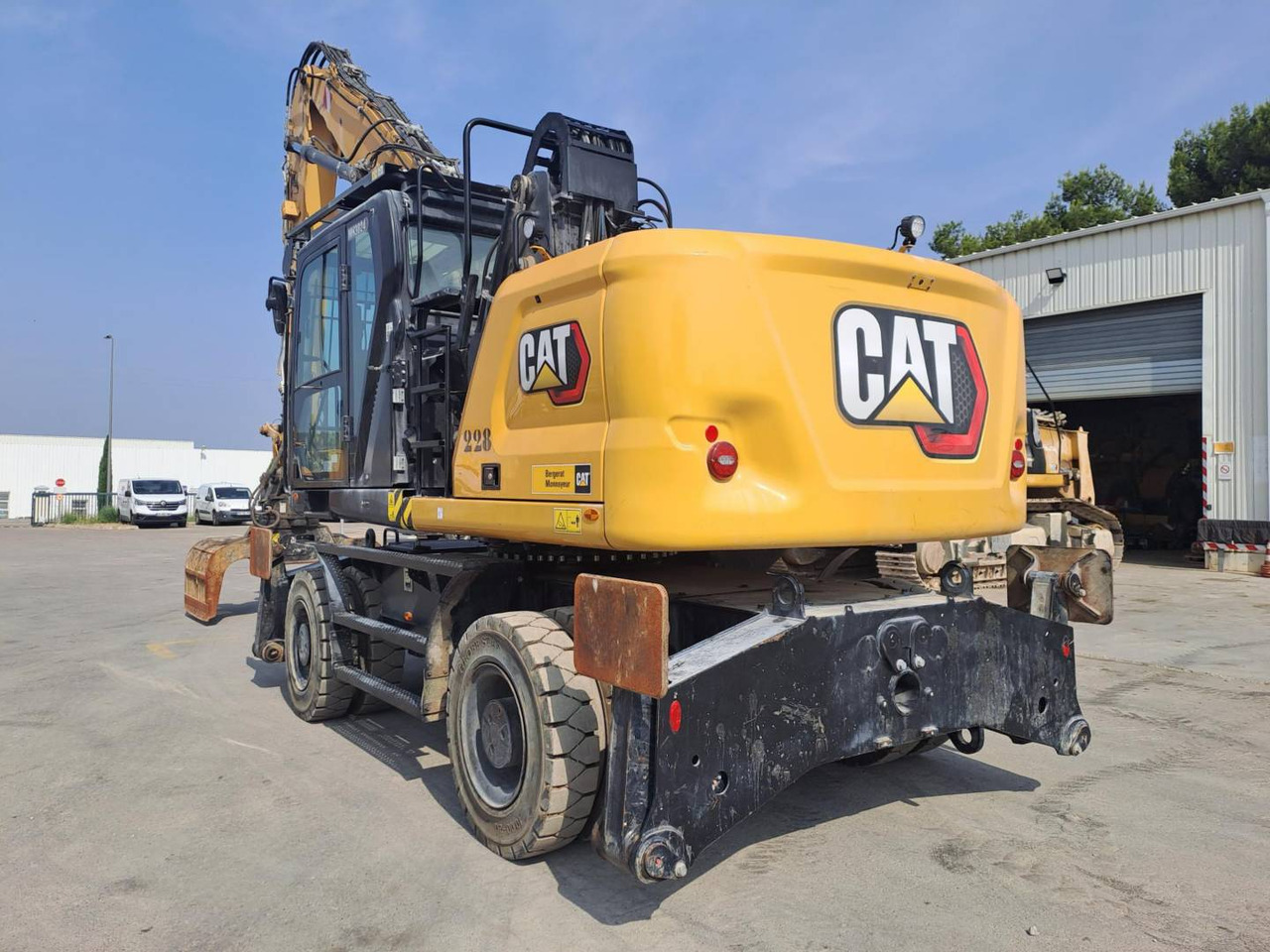 CAT MH3024 - حفارة دولاب: صورة 2 CAT MH3024 - حفارة دولاب: صورة 2